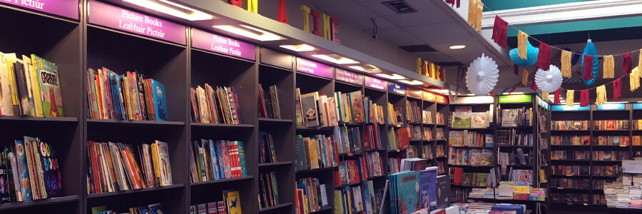 colourful Bookshelves and bunting in Hodges Figgis children's section