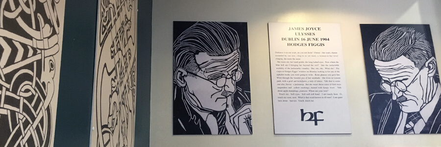 prints of james Joyce above the staircase in Hodges Figgis dublin